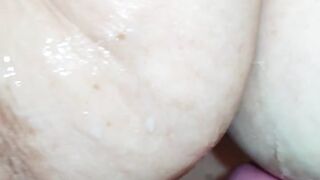 Slow motion cum on soft saggy tits