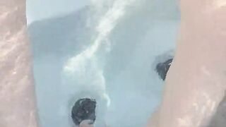 Hotwife and cub are in the hottub naked and rubbing cock