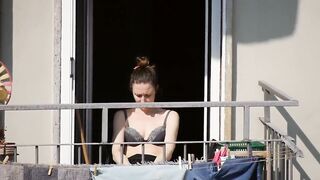 This nice mom gets some sun in bra during the lockdown