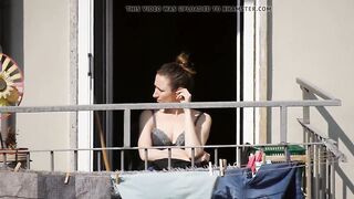 This nice mom gets some sun in bra during the lockdown