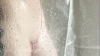 Hidden Iphone Catches Horny Tattooed Step-mom Masturbating in the Shower in Hot Portrait Video