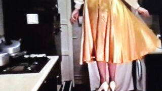 Wife in Gold Satin Skirt Dominated by Husband