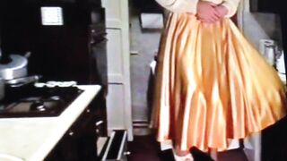 Wife in Gold Satin Skirt Dominated by Husband