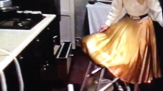 Wife in Gold Satin Skirt Dominated by Husband