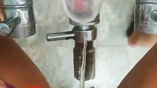 Tik Tok Standing Pee on the Tap in the Bathroom