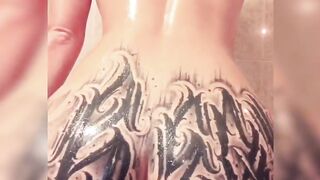 Inked Babe Bathtub Oil Play with Dildo