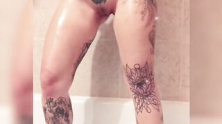 Inked Babe Bathtub Oil Play with Dildo