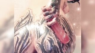 Inked Babe Bathtub Oil Play with Dildo