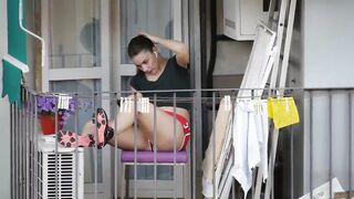 Candid girl relaxing on the balcony