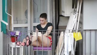 Candid girl relaxing on the balcony