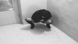 The Girl Takes off as a Girlfriend Pissing in a Public Entrance