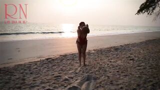 Nice Lady at Lonely Nudist Beach. Red Swimsuit. Red Bikini.