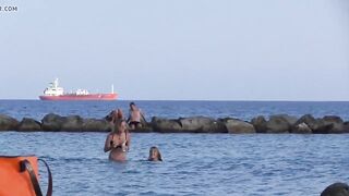 Beach girl goes for swimming in panties - watch out