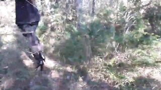 Walking on the wood wearing a black dress pantyhose heels