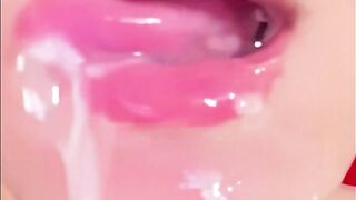 Playing with a mouthful of cum!