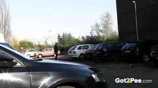 Squatting Between Parked Cars To Piss In Public