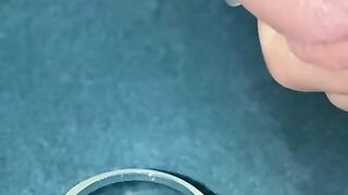 Closeup dripping cum in shot glass slo-mo