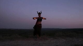 Candels Dance against the background of the night sky