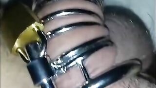 Putting on and wearing new chastity cage. complication