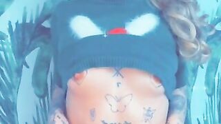 Tiny tattooed girl wants to show off her little ass for inspection...