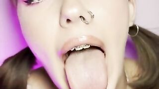 Mouth teasing. Sloppy girl with braces