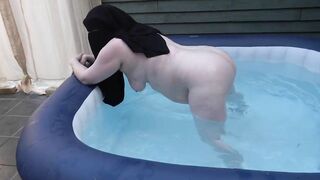 naked in Niqab in the hot tub