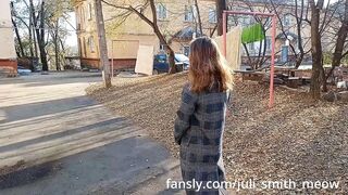 Horny female in a coat flashes tits and pussy in the neighborhood