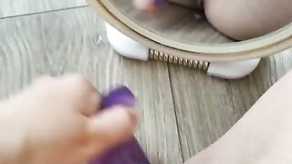 Jerking off purple dick in front of the mirror after my friend cum inside me