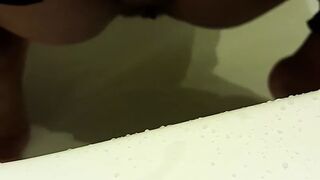 peeing in bathroom with fingering pussy