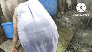 Bathing outside in Indian style