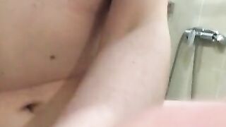 Girl with a very hairy pussy put her leg on the washbasin and pissing in it