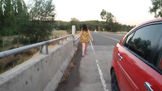 BBW walking outdoors in highway