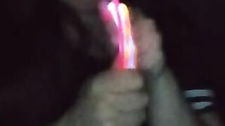 Fucking my mouth and pussy with glow sticks