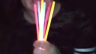 Fucking my mouth and pussy with glow sticks