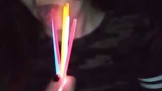 Fucking my mouth and pussy with glow sticks