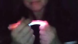 Fucking my mouth and pussy with glow sticks