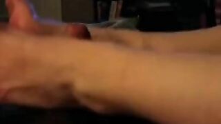 Wife gives a foot job and gets cum all over her feet