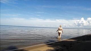 Naked big ass in beach