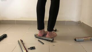 Woman Crushing Toy Trains Under Her Big Feet