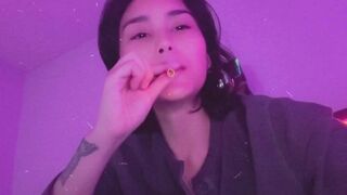 petite stoner babe rolls a blunt + gives u a tease