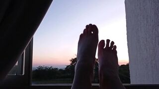 APPRECIATE THIS BEAUTIFUL SUNSET NEXT TO MY FEET