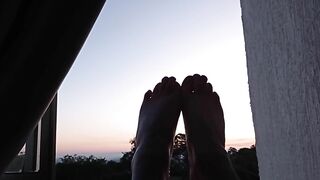 APPRECIATE THIS BEAUTIFUL SUNSET NEXT TO MY FEET