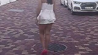 Local street walking hooker with no bra and big nipples gets picked up quickly in public