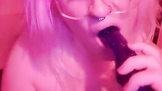 Sweet Nerdy Girl Grips Dildo With Split Tongue