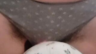 Pillow humping wearing a suction toy orgasm