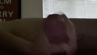 Thick cock gets jerked off until a cumshot